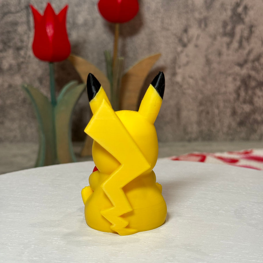 Adorable Pikachu holding a bright red heart, radiating love and sweetness—perfect for Valentine’s gifts or desk decor!