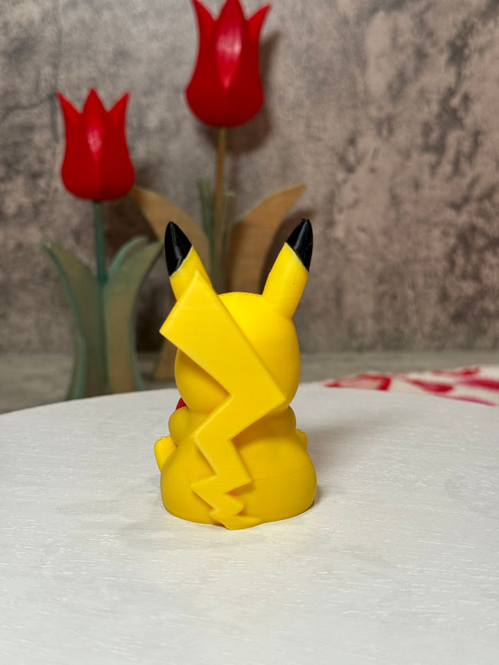 Adorable Pikachu holding a bright red heart, radiating love and sweetness—perfect for Valentine’s gifts or desk decor!