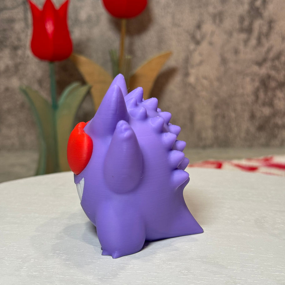 Purple Gengar with a giant grin and bold red heart eyes, arms raised in excitement and full Valentine’s Day spirit.