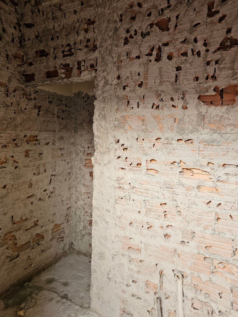 Retirada do revestimento do banho da sauna