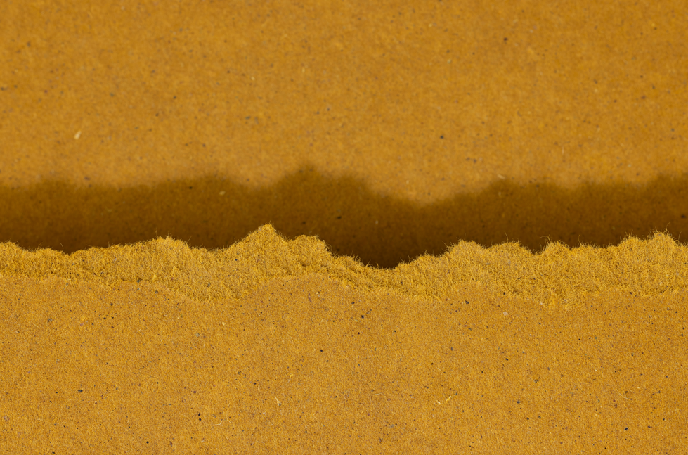 Goldenes Papier mit sanftem Lichtverlauf