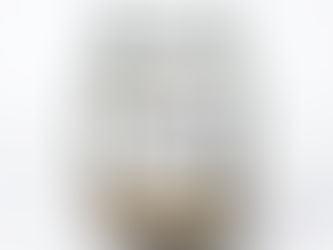 A glass jar labeled Taxes filled with coins