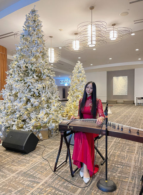 Annie Zhou performing at Anaheim Marriott Corporate Christmas Party