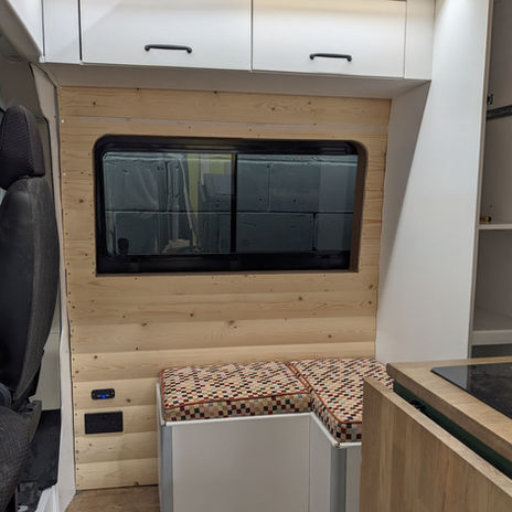 Windows with L-shaped seating
Campervan in Scotland