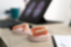 A close-up view of implant-supported dentures (snap-in overdentures) displayed on dental molds in a professional dental office—offering affordable and stable denture solutions in Bossier City and Shreveport.