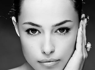 A woman's face with Symmetrical represting a Brows Brow lift