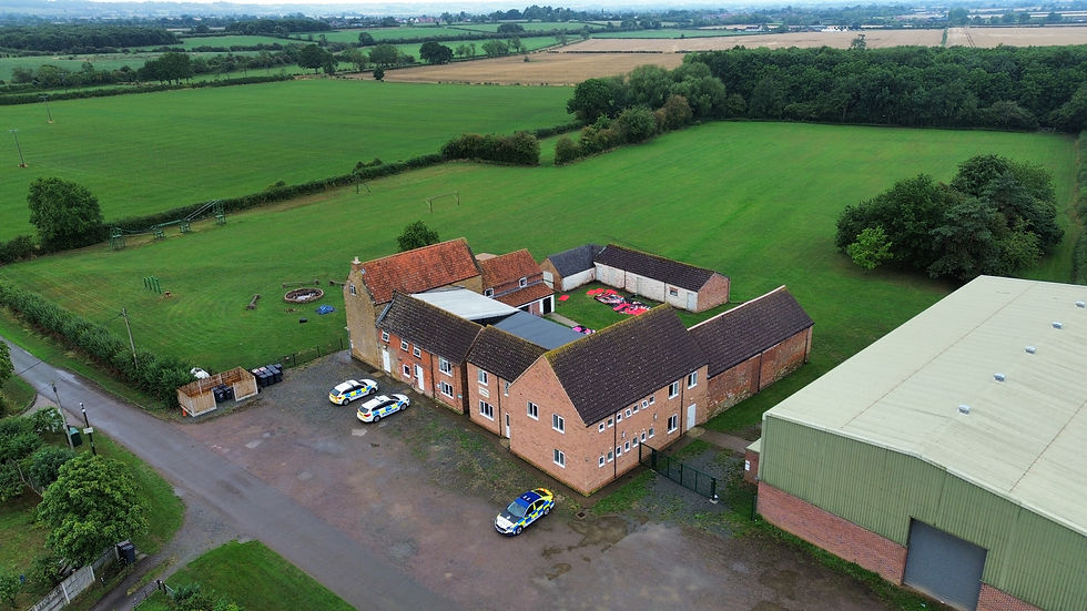 Police pictured at the lodge last year during the investigation. Photo: NEMM archive.
