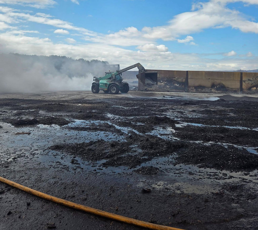 Crews are are spreading out the pile to reduce the temperature. Photo: Leicestershire Fire & Rescue Service