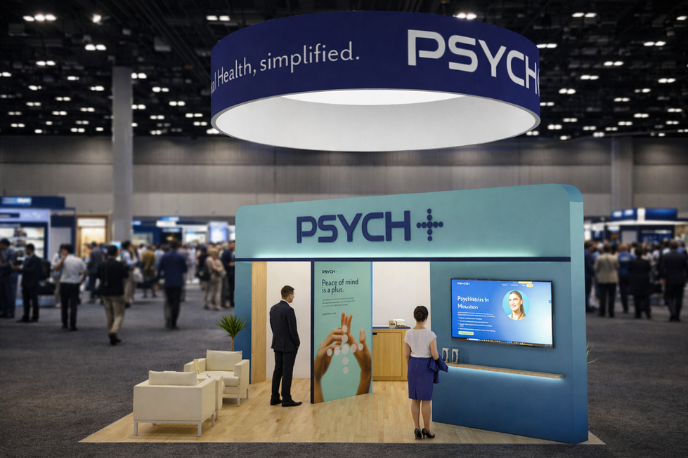 PSYCH exhibit booth, 'Health, simplified.', in hall with people