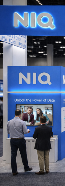 NielsenIQ trade show booth 'Unlock the Power of Data'