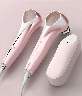 two-pink-silver-beauty-devices-with-charging-base.jpg