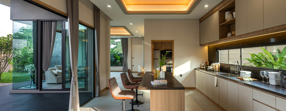 Grand 4-bedroom luxury villa with large garden plot and modern contemporary design at Ascent by Baan Pattaya.