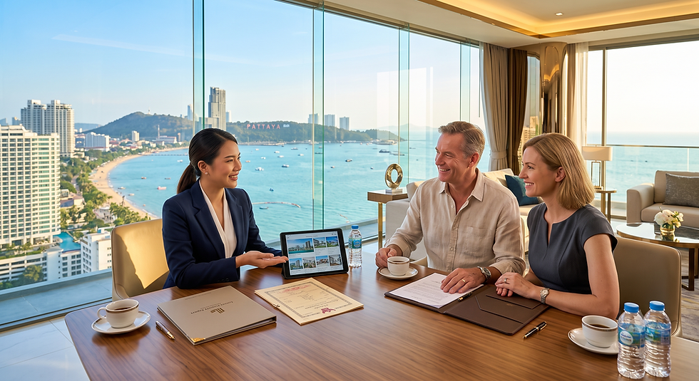 A professional real estate agent Pattaya discussing property investment options with an expat couple inside a luxury beachfront condo with panoramic sea views.