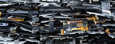 Big stack of old broken mobile phones and smartphones
