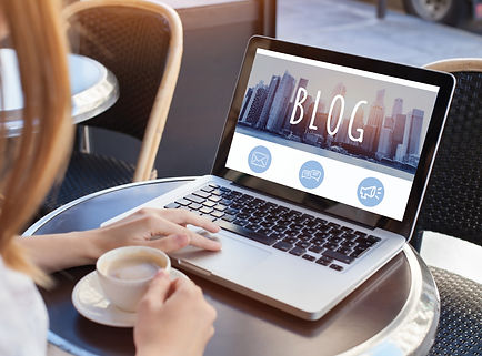 woman reading blog online on computer