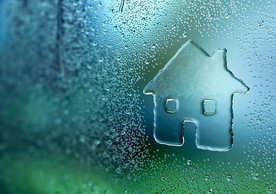 House outline on rainy window