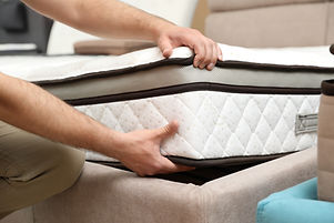  choosing new mattress in store