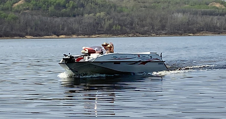 Boat cruising on lake