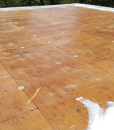 Prepping a custom home for a flat roof liner in Calodon Ontario.jpg