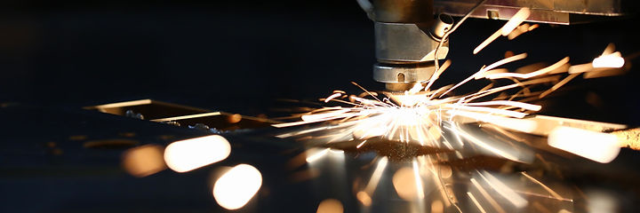 Sparks fly out machine head for metal processing