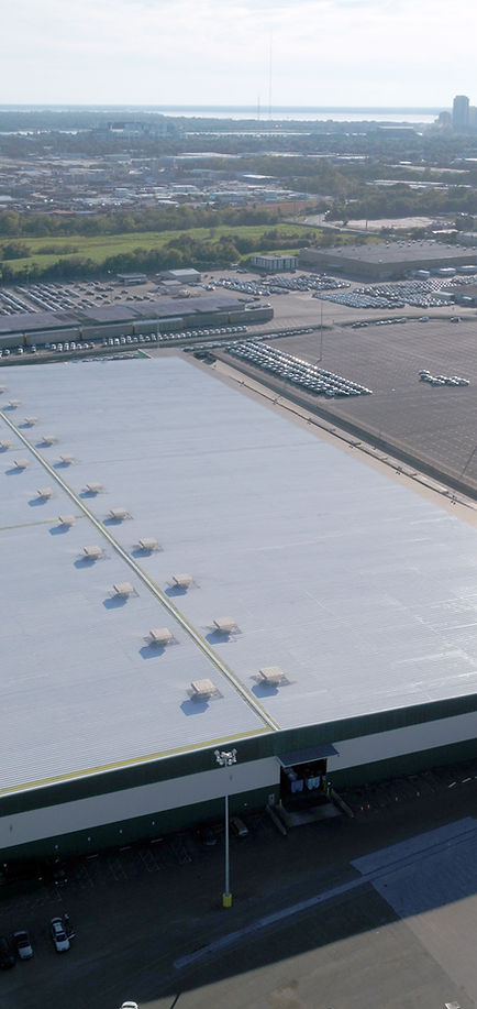 Roof coating on a commercial building.jpg