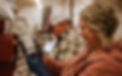 Lesa Givens preparing a bottle of Olympia Artesian Vodka on the distillery floor