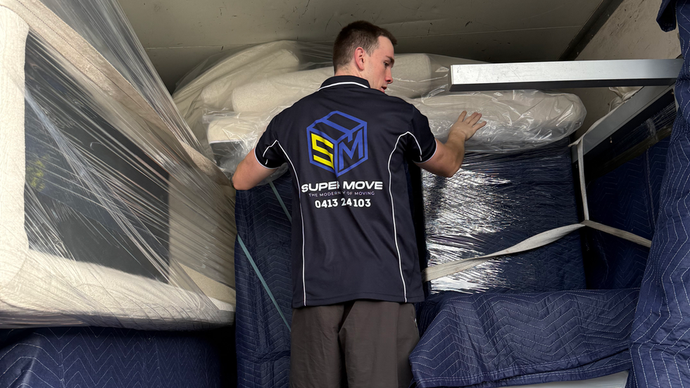 Super Move Sydney Removalist loading a truck with furniture
