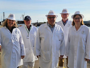 The welcome party with HM Ambassador designate to Iceland, Jane Stevens, left, on the quayside at Port of Grimsby East.