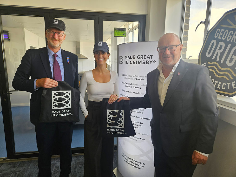 GFDG chair Simon Dwyer, right, presents gifts to both Icelandic Ambassador to the UK, Thordis Kolbrun Gylfadottir, and retiring Grimsby-area Consul, Jonathan Goolden, after the lunch at Alfred Enderby Ltd, where Mr Dwyer briefed the Ambassador on the strength of the cluster and the Made Great in Grimsby brand's presence.