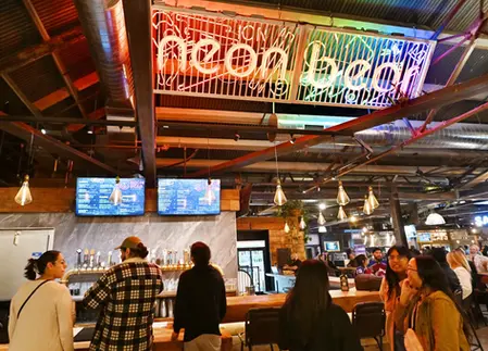 Neon Bear bar inside the Redlands Public Market