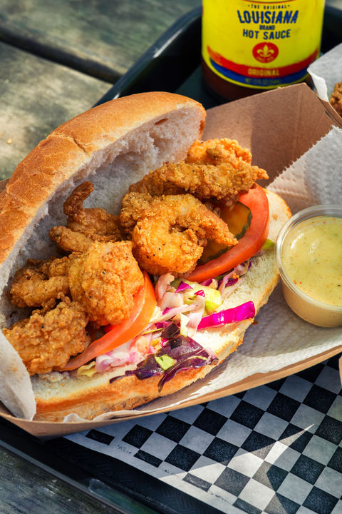 Fried shrimp po'boy with lettuce and tomato