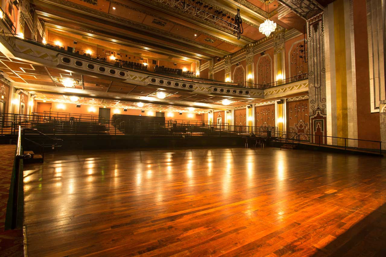 a view from stage right of the main floor and seating and balcony at the Fox Theater in Pomona