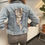 Thumbnail: Cat Busting Out Jean Jacket