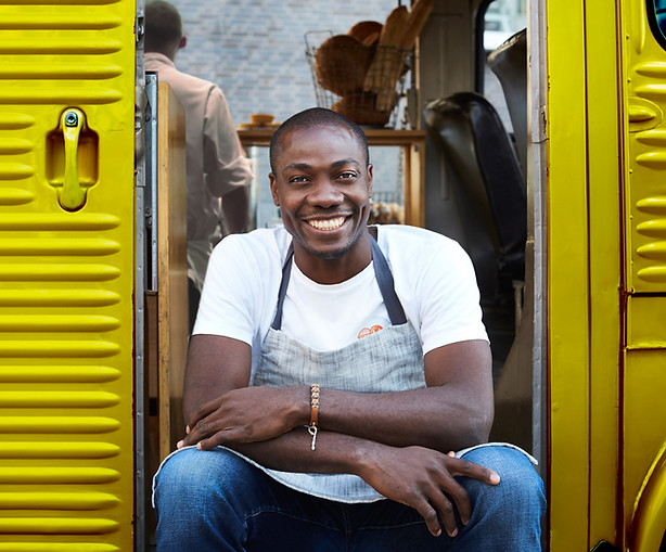 Man on Doorway of Food Truck