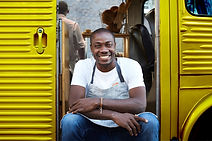 Man on Doorway of Food Truck