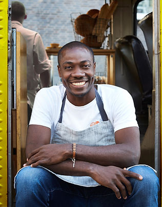 Man on Doorway of Food Truck