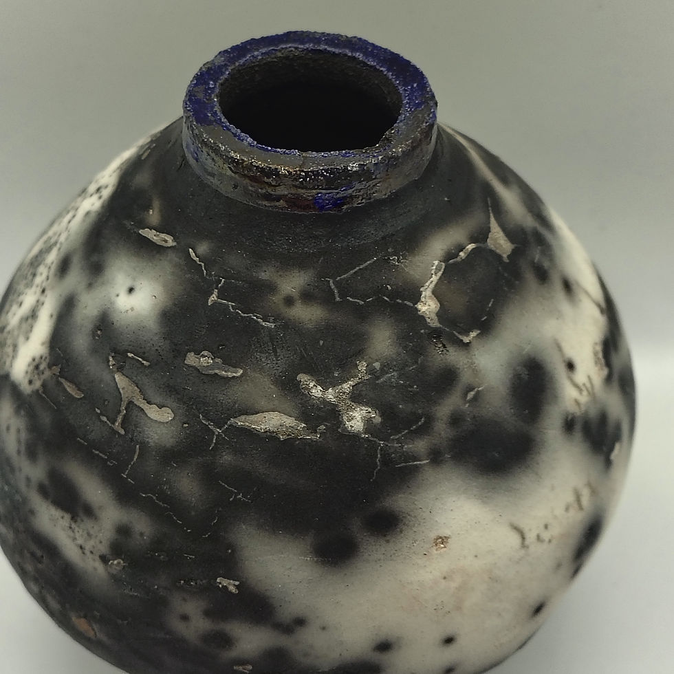 Thumbnail: Naked Raku Moon Pot