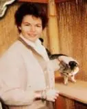 early-picutre-of-jean-mill-with-leopard-cat.webp