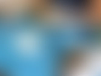 Veterinarian performing early spay or neuter surgery on a kitten using pediatric protocols.