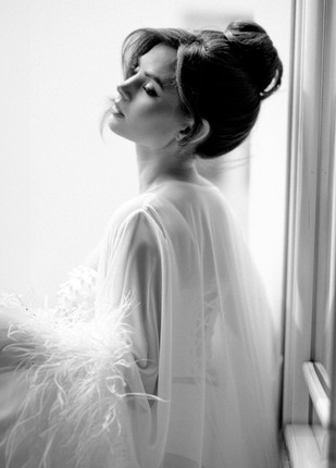 "Glamorous Paris wedding photoshoot with bride and groom, breathtaking floral arrangements, and expert photography by Tina Vedrine."