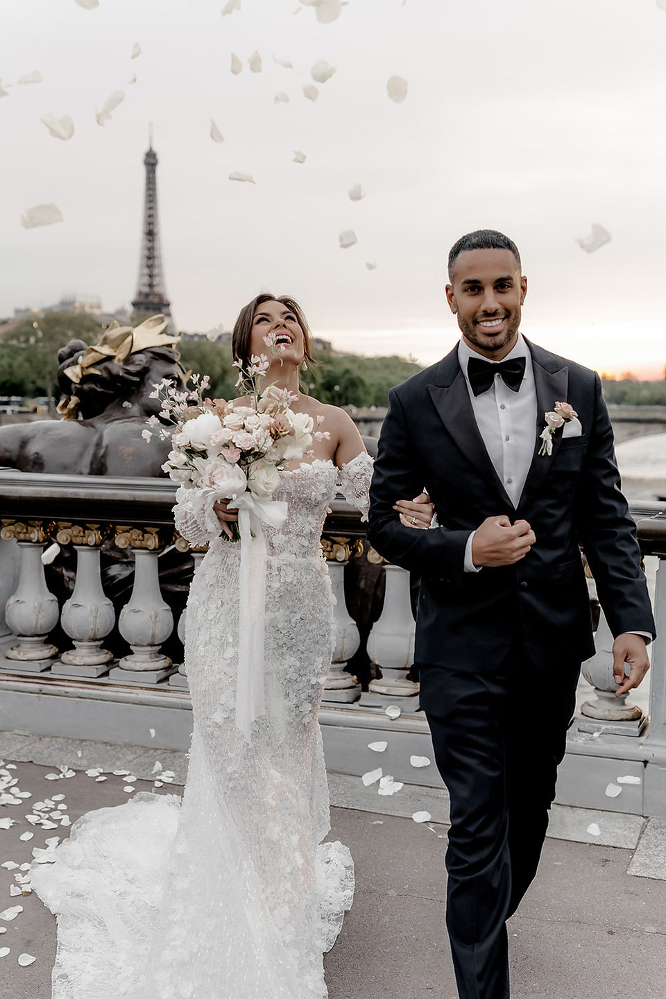 "Glamorous Paris wedding photoshoot with bride and groom, breathtaking floral arrangements, and expert photography by Tina Vedrine."