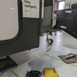 External caravan damage being repaired.