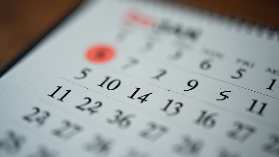 High angle view of a calendar with important dates marked