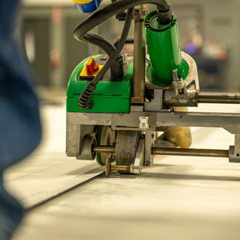 The main seams in the liner are hot-air welded together with a robotic welder at MEB Systems facility.