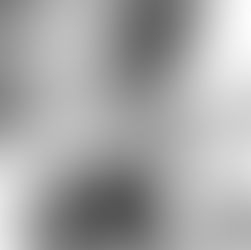 A lady holding out some handcuffs