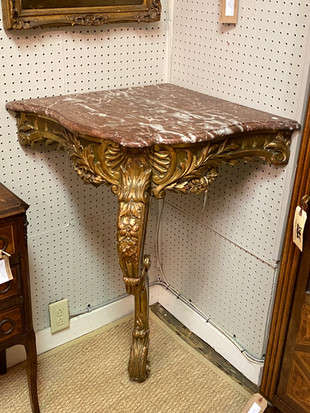 Antique French carved giltwood Louis XV corner console with breche rouge Languedoc marble top