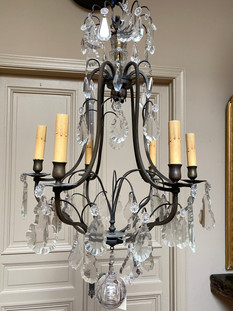 Antique French dark brass 6 light cage chandelier with crystal drops, rosettes, and hollow cut ball