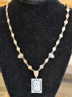 Necklace Made from Assorted Antique 19th-Century French Catholic Rosary Medallion Plaques in Silver Plate, with a Chinese Mother-of-Pearl Gaming Token Pendant 
