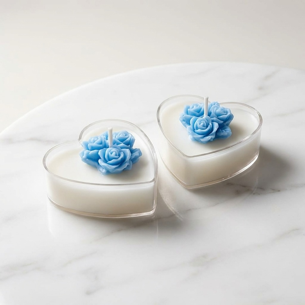 Handmade heart-shaped soy wax candles with blue floral designs by Aroma Path.