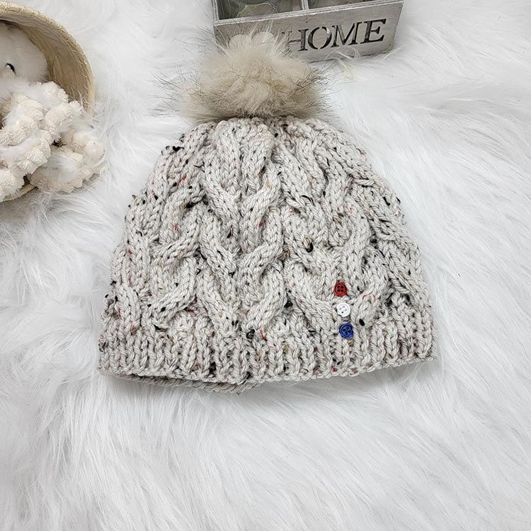 Bonnet en laine, coloris au choix.